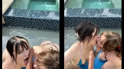PeachJars and her friend sucking a dildo
